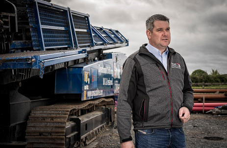 man beside machinery