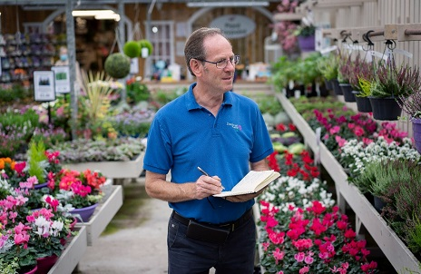 man in garden nursery